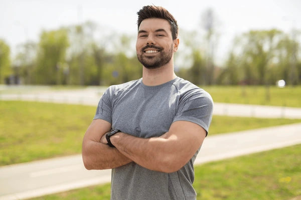 files/confident-athletic-man-standing-outdoors-600nw-2613210559.webp